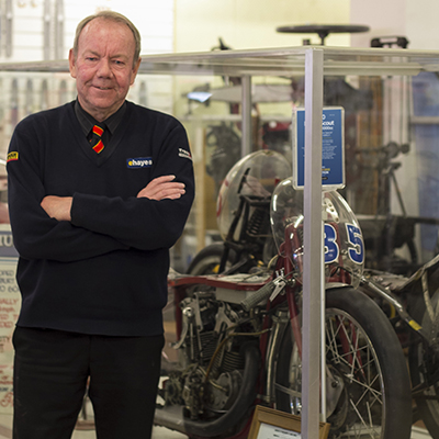 E Hayes Managing Director Mr Neville Hayes with Burt Munro´s Authentic, Original and Legendary 1920 Indian Scout - the ´Munro Special´. 